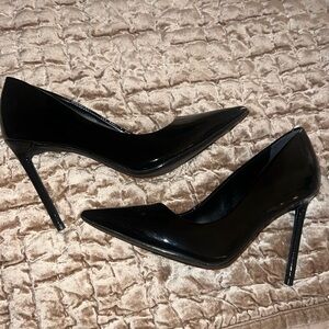 Black patent leather pumps